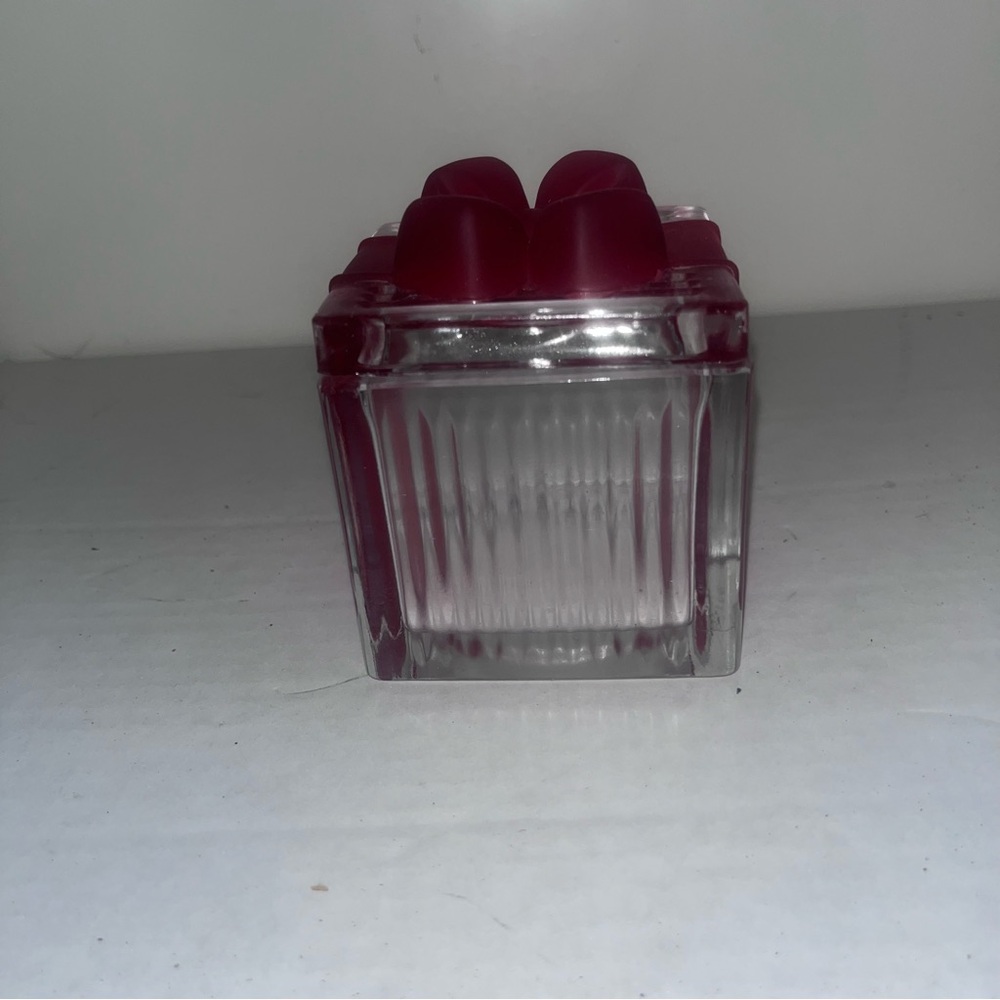 Red and Clear Glass Container